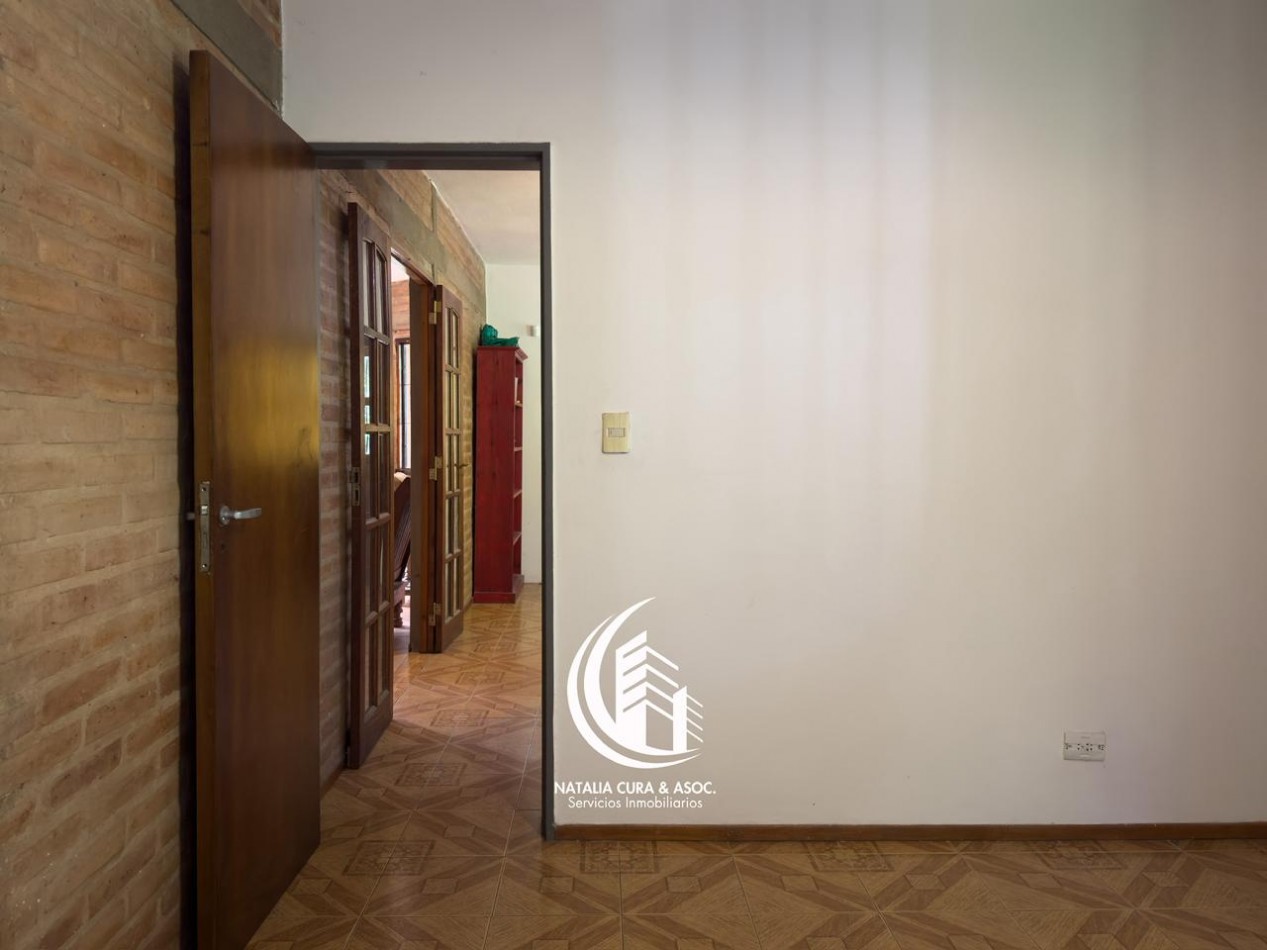 Arguello: Oasis Natural de 1.400 m² con Potencial para 5 Viviendas