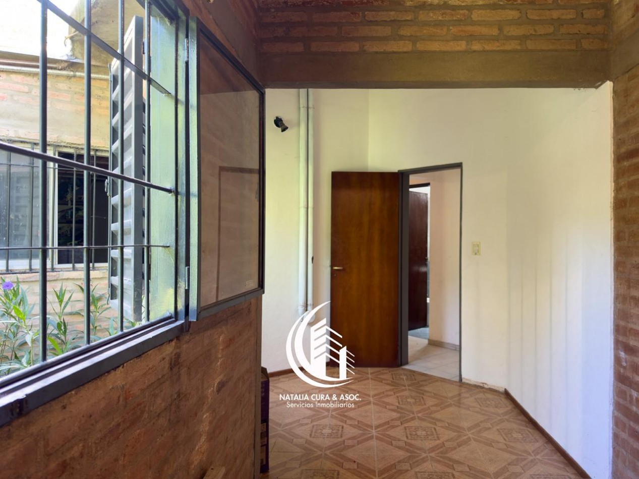 Arguello: Oasis Natural de 1.400 m² con Potencial para 5 Viviendas