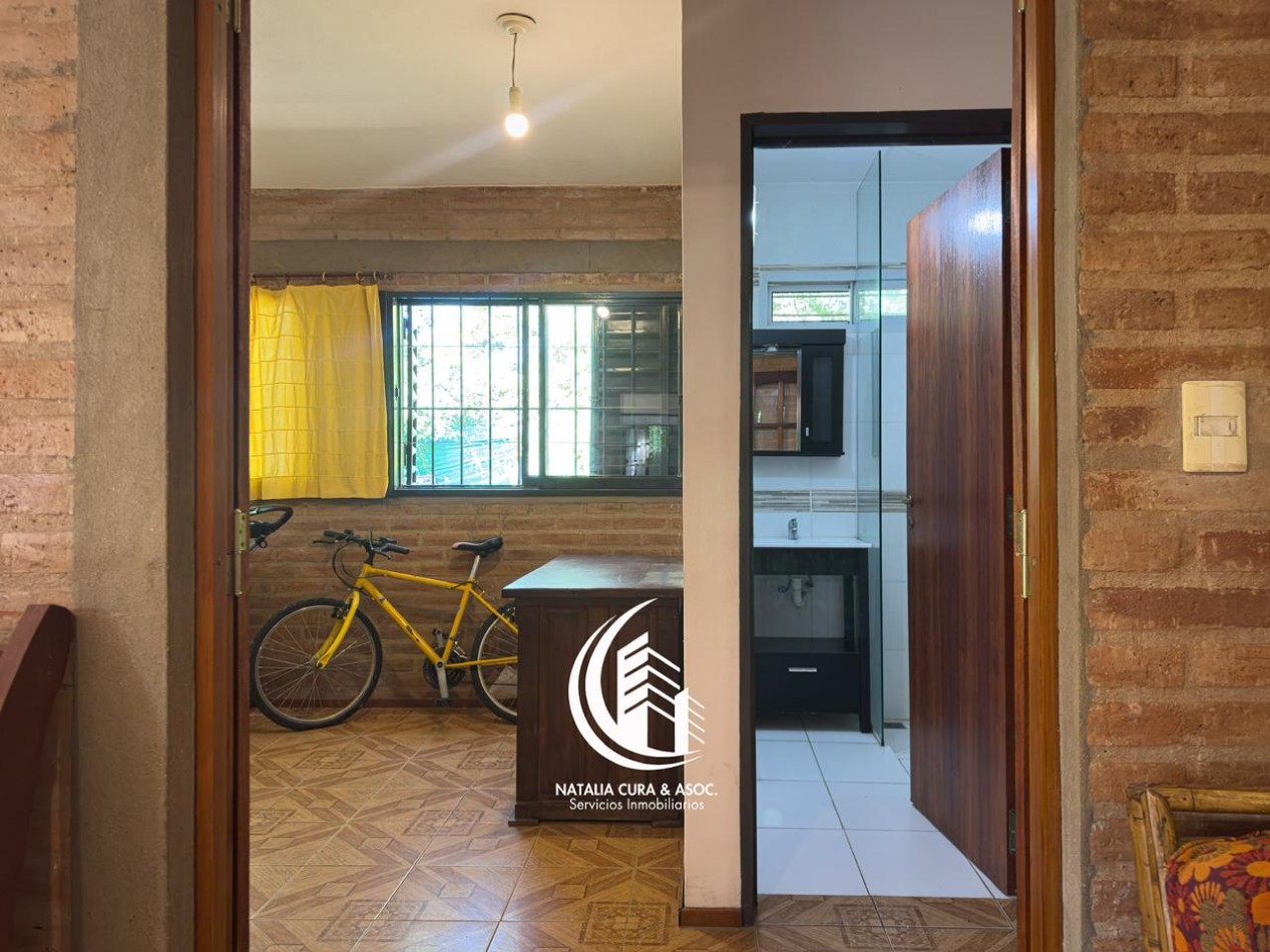 Arguello: Oasis Natural de 1.400 m² con Potencial para 5 Viviendas