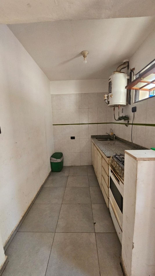 Arguello: Oasis Natural de 1.400 m² con Potencial para 5 Viviendas