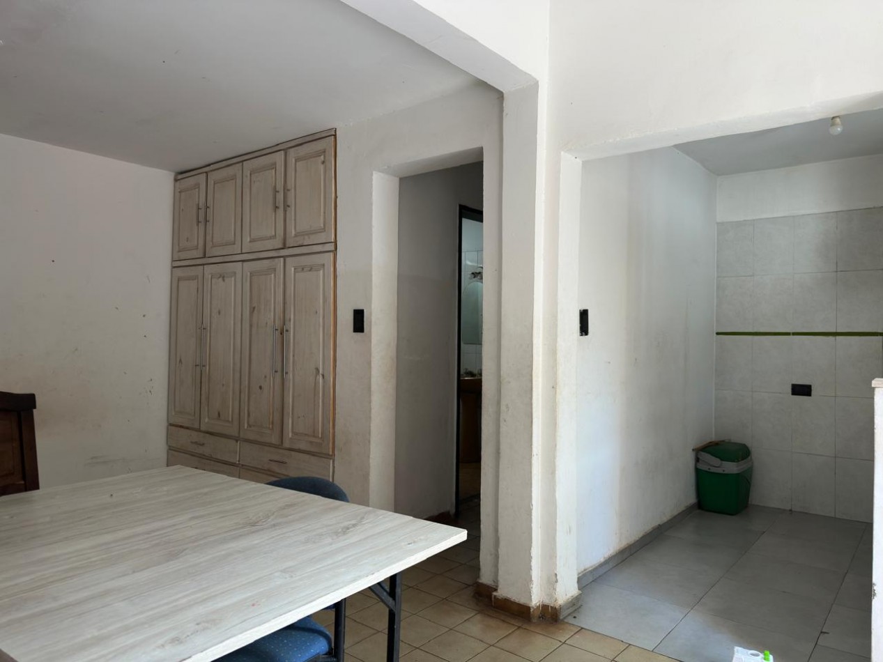 Arguello: Oasis Natural de 1.400 m² con Potencial para 5 Viviendas