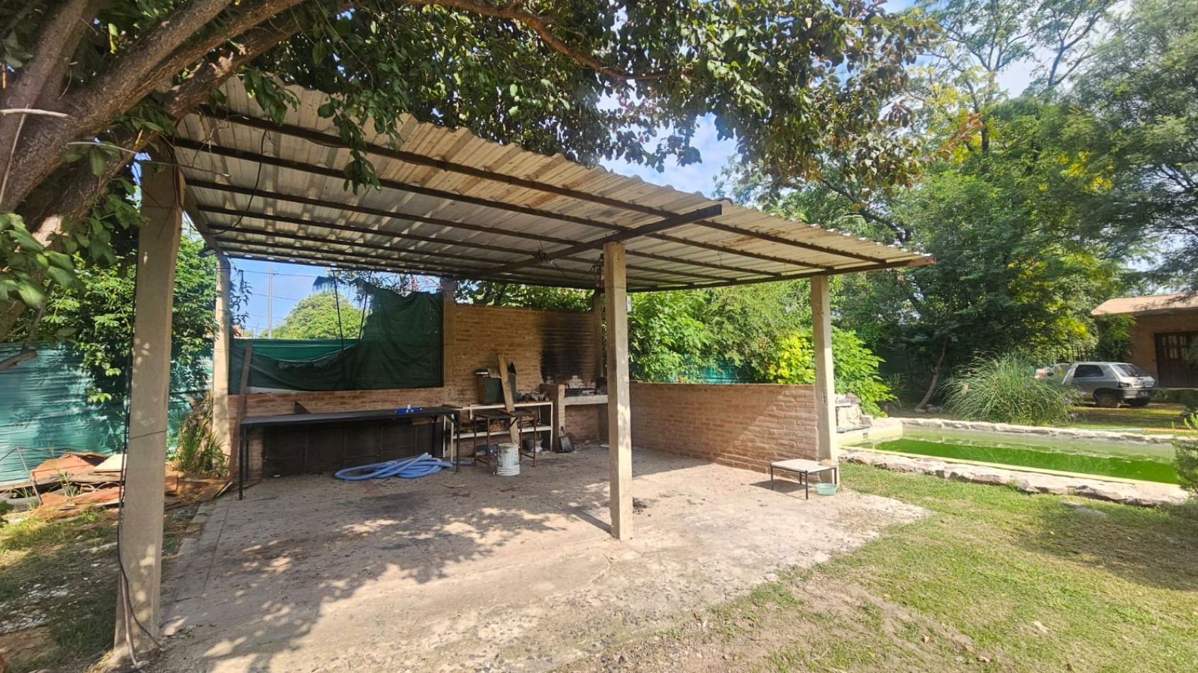 Arguello: Oasis Natural de 1.400 m² con Potencial para 5 Viviendas