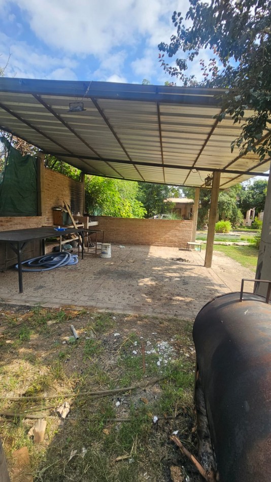 Arguello: Oasis Natural de 1.400 m² con Potencial para 5 Viviendas